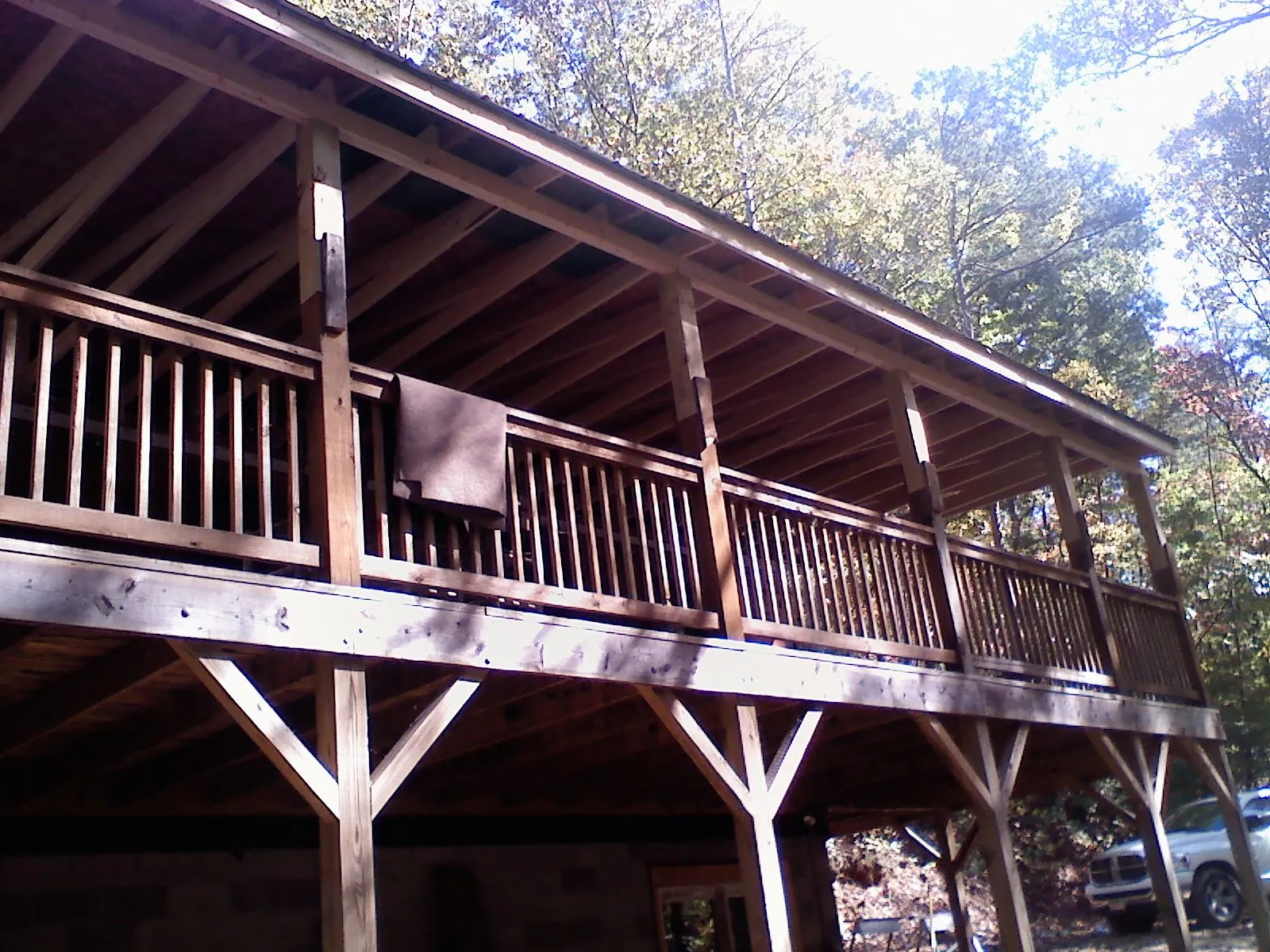 Timber framing under a new elevated porch and deck — Roof Leak Repair in Tonganoxie by Roofing Brothers